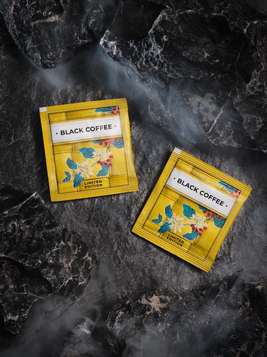 yellow sachtes of premium black coffee product